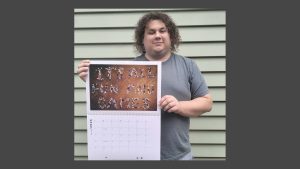 Ben with his 2026 calendar artwork