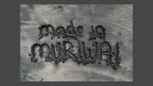 2026 calendar artwork with text "Made in Muriwai" written in the sand